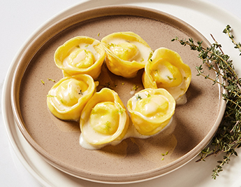 piatto tortelli ripieni formaggio fresco timo limone